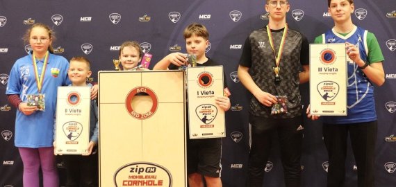 J. Tūbelio progimnazijoje auga „Cornhole“ žaidimo karta: pirmieji stulbinantys rezultatai šalies mastu